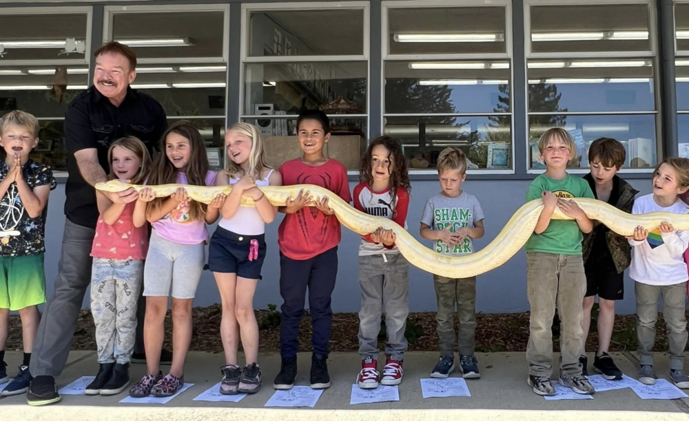 kids with big snake