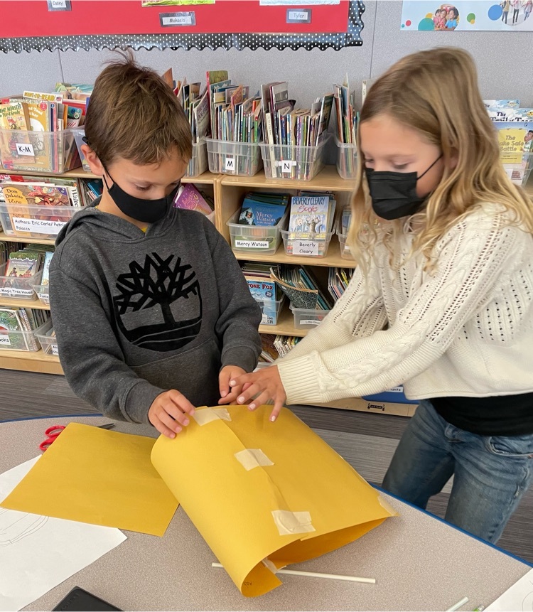 two students working together 